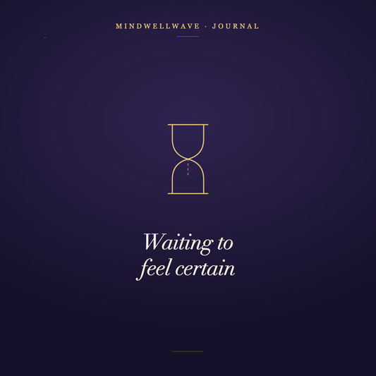 An hourglass with the sand held between chambers